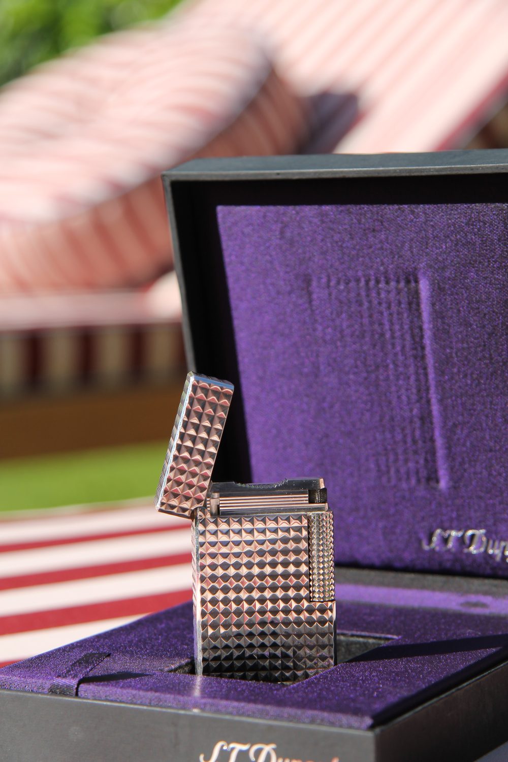 S.T. Dupont Ligne 1 Grand diamond point lighter open in its black and purple box